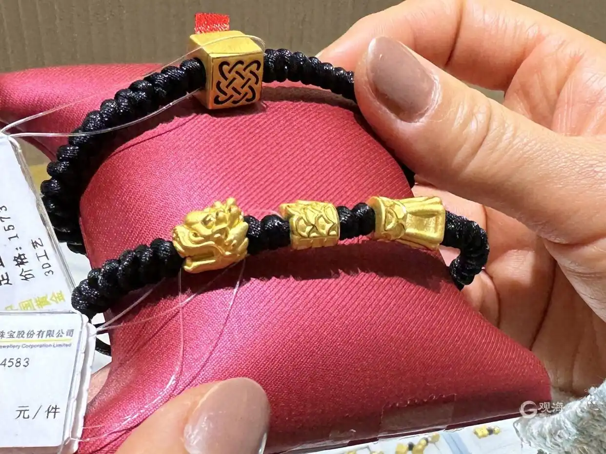 青岛黄金饰品价格_春节黄金消费热_生肖龙金饰销售火爆